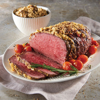 Prime Rib Roast with Feta-Parmesan Crust and Rosemary Tomatoes Served with Creamy Mushroom Barley