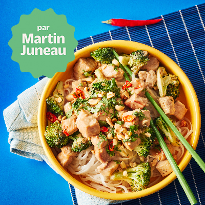 Stir-fried pork loin with roasted broccoli and house peanut sauce